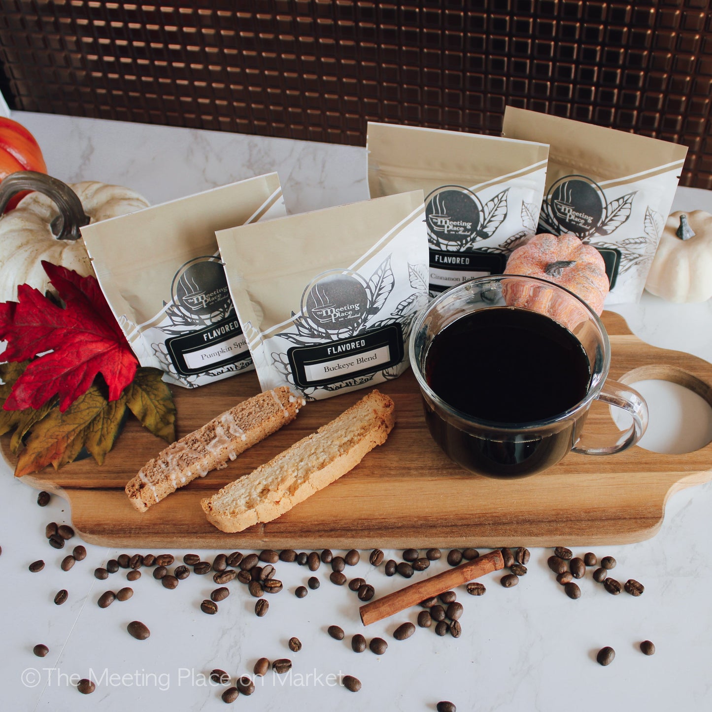 https://meetingplaceonmarket.com/cdn/shop/products/fall-favorites-coffee-sampler-gift-box-with-biscotti-and-hot-cocoa-928641.jpg?v=1690483724&width=1445